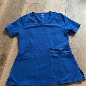Small yoga Jaanuu scrub top, royal blue